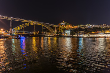 Porto with the monastery da serra do pilar and Luis I bridge during night, Portugal