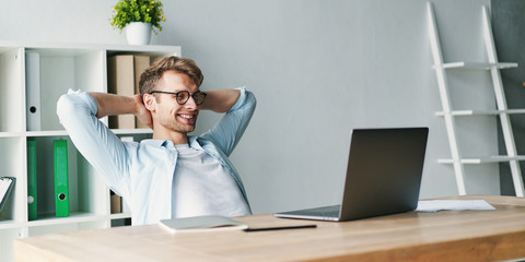 Young smiling man smiling while
