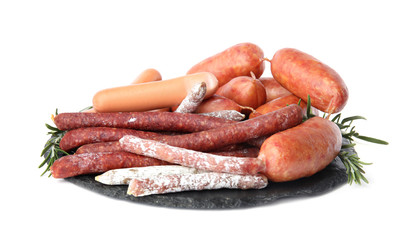 Slate plate with different tasty sausages isolated on white