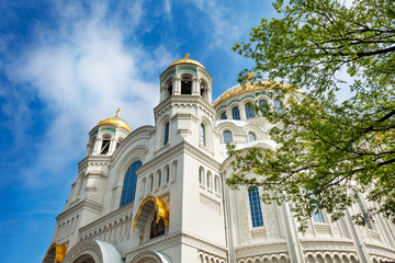 Naval cathedral of Saint Nicholas, Kronstadt, Russia, against cloudy sky