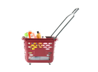 Shopping basket full of cleaning supplies isolated on white