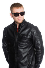 Obraz premium Young European man with beard in sunglasses