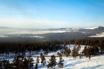 Fototapeta na wymiar Scenic winter landscape view from Rinpoche Bagsha datsan mount by winter, Ulan-Ude, Russia