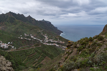 Fototapeta premium Panoramic landscape in Anaga mountains and ocean coastline from Mirador Risco Magoje viewpoint, Tenerife Canary Islands, Spain