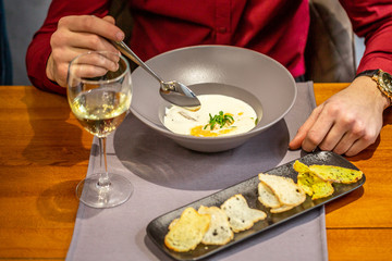 Delicious homemade food from environmental products. serving cheese soup with turkey
