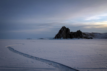 Scenic view of Shamanka rock, Olkhon Island, frozen Baikal Lake, Russia