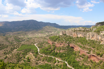 Fototapeta na wymiar The cloudy sky over the valley of Priorat and Montsant in Catalonia, the view from Siurana village