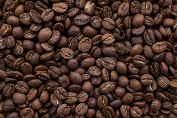 Top view medium roasted arabica coffee bean, background.