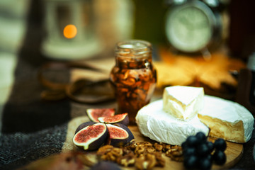 Detail of figs, grapes,cheese, walnuts