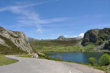 Road near lake in mountains at high altitude