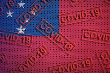 Samoa flag and many red Covid-19 stamps. Coronavirus or 2019-nCov virus concept
