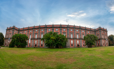 View of Royal Palace of Capodimonte Gardens at sunset in Naples