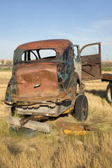 Junk car in field near South Dakota and Nebraska border