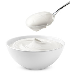 Fototapeta na wymiar sour cream in bowl and spoon, mayonnaise, yogurt, isolated on white background, clipping path, full depth of field