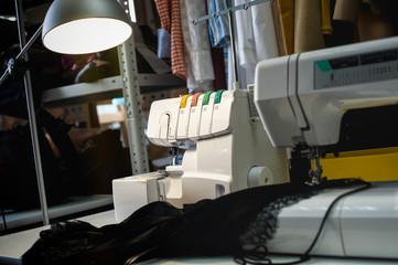 sewing and creating clothes in the studio