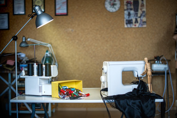 sewing and creating clothes in the studio