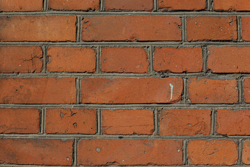Obraz premium background from the surface of the red brickwork