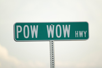 Road sign for Pow Wow Highway representing American Indians in South Dakota