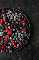 frozen raspberries, blackberries and blueberries close up