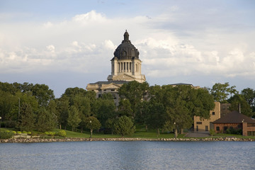 Lake with view of South Dakota State Capitol and complex, Pierre, South Dakota, built between 1905...