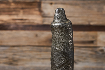 large fragment of pyrite texture on a wooden background