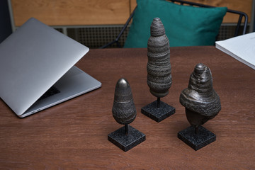 a group of pyrite figurines on the desktop