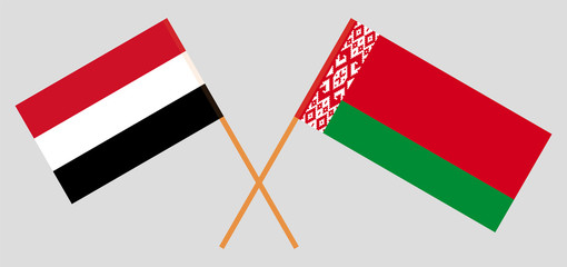 Crossed flags of Belarus and Yemen