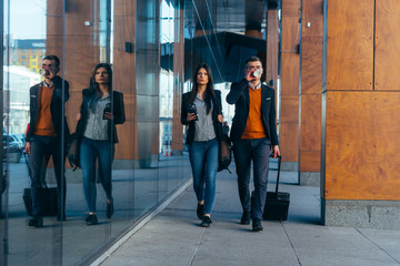 Bussiness couple walking through a futuristic modern station