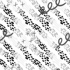 Seamless pattern with hand drawn abstract elements in black and white colors on a white background