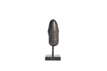 mineral pyrite as a statuette on a white background
