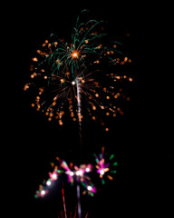 Obraz premium New Years or 4th of July Fireworks in a Night Sky