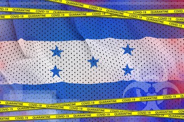 Honduras flag and Covid-19 quarantine yellow tape. Coronavirus or 2019-nCov virus concept