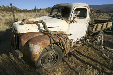 Fototapeta na wymiar Rusty old deserted truck on Route 33, near Cuyama, California