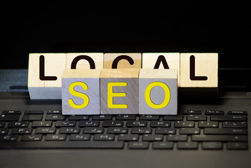 cubes with the acronym SEO for search engine optimization