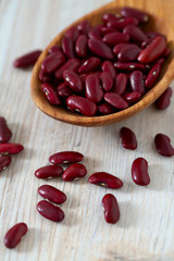 red beans in a wooden spoon