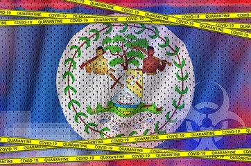 Belize flag and Covid-19 quarantine yellow tape. Coronavirus or 2019-nCov virus concept