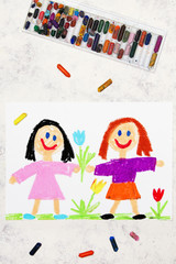Photo of colorful drawing: two smiling girls. Sisters or friends