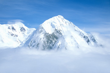 Fototapeta na wymiar Mountain tops in St. Elias National Park and Preserve, Wrangell Mountains, Wrangell, Alaska