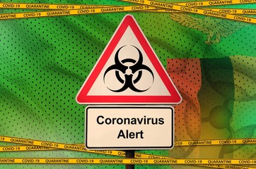 Zambia flag and Covid-19 biohazard symbol with quarantine orange tape. Coronavirus or 2019-nCov...