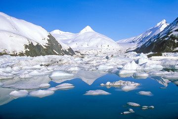 Fototapeta na wymiar Portage Glacier and Portage Lake as seen from Seward Highway, Alaska