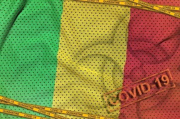 Mali flag and Covid-19 biohazard symbol with quarantine orange tape and stamp. Coronavirus or...