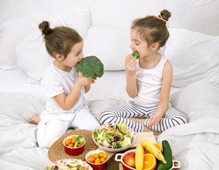 Healthy food, children eat fruits and vegetables.