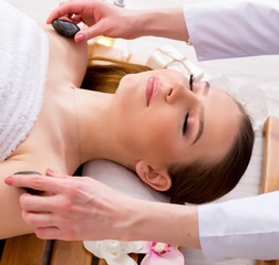 Fototapeta na wymiar Young woman during spa procedure in salon