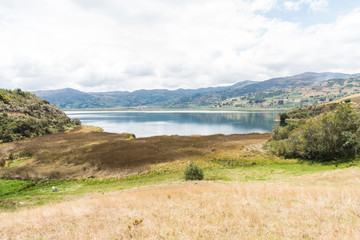 Fototapeta na wymiar Rural Andean landscape, Lake Tota and the fields that surround it