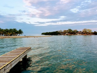 A view off the docks of the sandy tip of Placencia, Belize