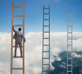 Young businessman climbing career ladder