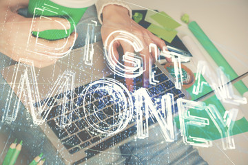 Double exposure of woman hands typing on computer and crypto market theme hologram drawing. Blockchain concept.
