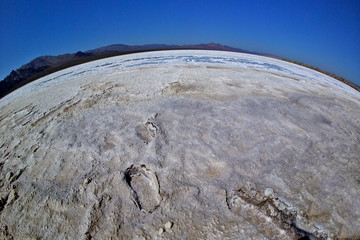 Fisheye view of Footprints on soft salt surface, Bristol Lake, California 