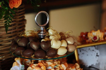 closeup of sweets, heart sweets, valentines day,  condensed milk candy balls, chocolate truffles, brigadeiro, chocolate sprinkles, chocolate candy