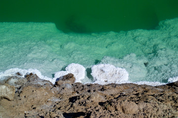 Chlorides precipitate at edge of salt evaporation pond, Bristol Lake, California 